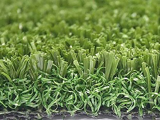 人造草足球场建设可以选择免填充草坪